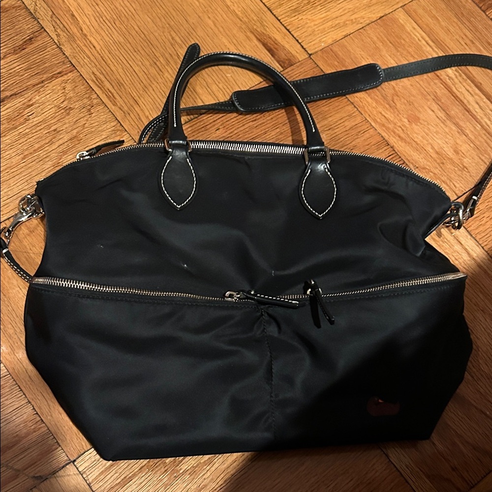 Donney&Bourke lightweight nylon bag with 2 handles and a strap.
